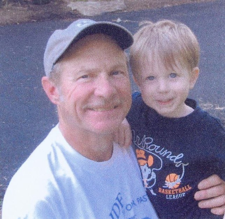 Dr. John H. Spencer with grandson.