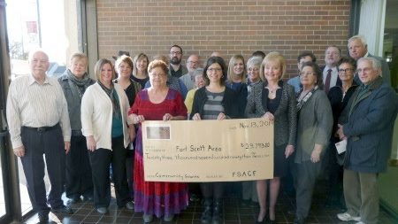 FSACF 2014 grant recipients pose with an oversized check.